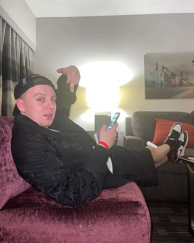 Aitch outfit in Gucci and Nike, 2022