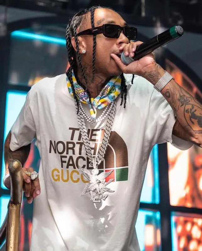 Tyga outfit in Gucci, Prada, and The North Face, 2022