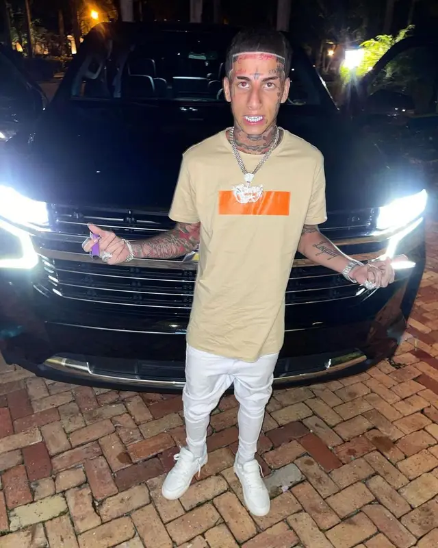 Flyysoulja outfit in Balmain, Off-White, and Dolce & Gabbana, 2022
