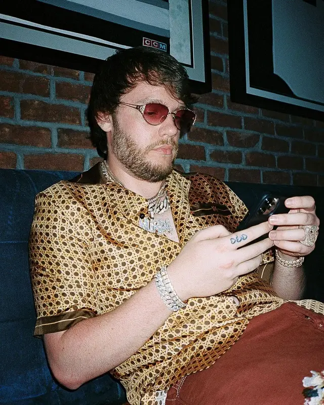 Murda Beatz outfit in Amiri, Jordan, and Off-White, 2022