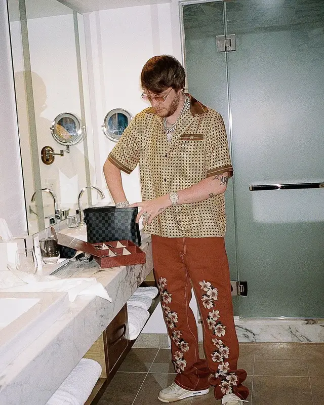 Murda Beatz outfit in Amiri, Jordan, and Off-White, 2022