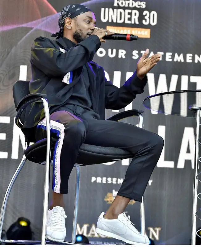 Kendrick Lamar outfit in Pieces Uniques, Brothers 4 Life, and Nike, 2017