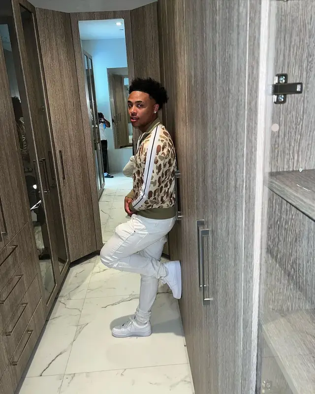 Luh Kel outfit in Palm Angels, Purple Brand, and Nike, 2022
