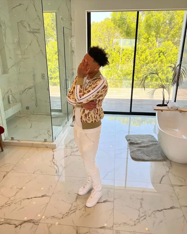 Luh Kel outfit in Palm Angels, Purple Brand, and Nike, 2022