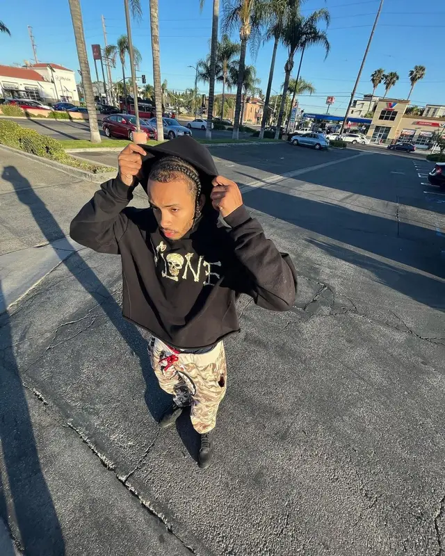 Amari Bailey outfit in Vlone, Bape, and OVO, 2022