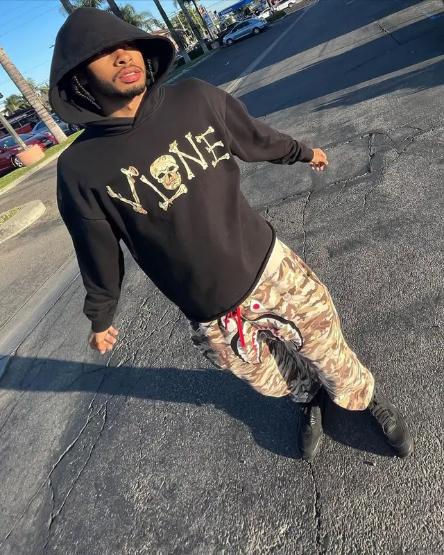 Amari Bailey outfit in Vlone, Bape, and OVO, 2022
