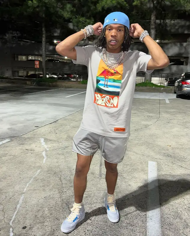Lil Baby outfit in Heron Preston, Fear of God, and Jordan, 2022