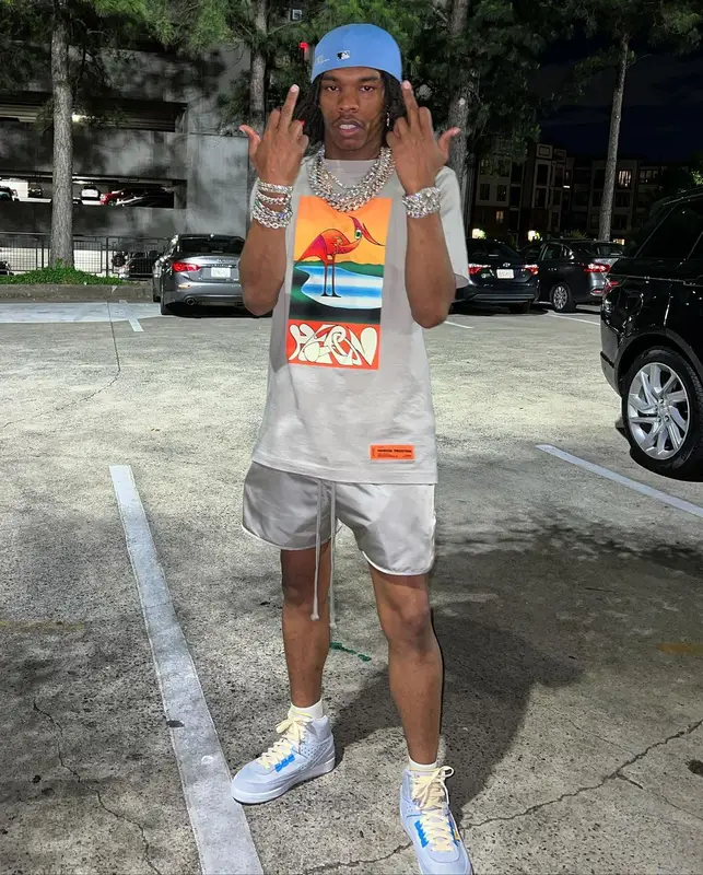 Lil Baby outfit in Heron Preston, Fear of God, and Jordan, 2022