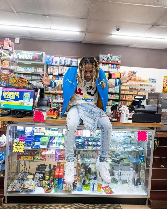Lil Durk outfit in Rhude, Louis Vuitton, and The Webster, 2022