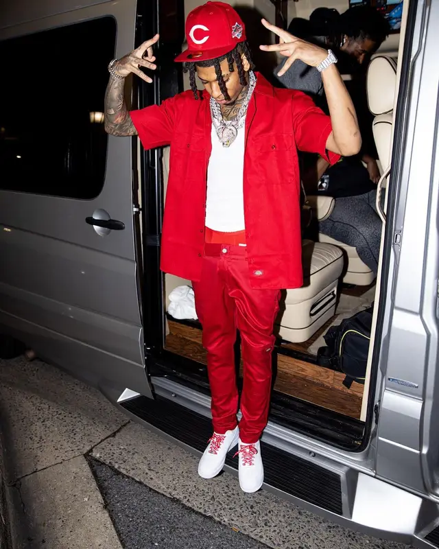 NLE Choppa outfit in Dickies, Supreme, and New Era, 2022