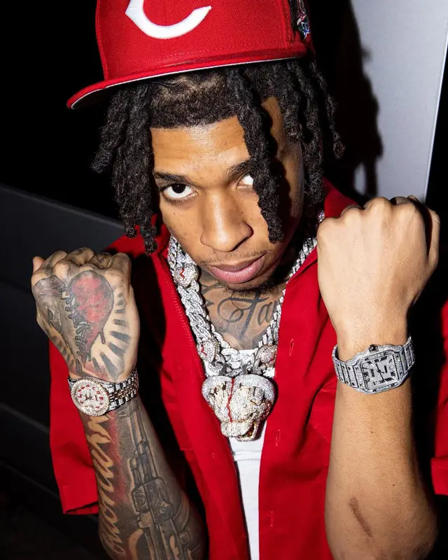 NLE Choppa outfit in Dickies, Supreme, and New Era, 2022