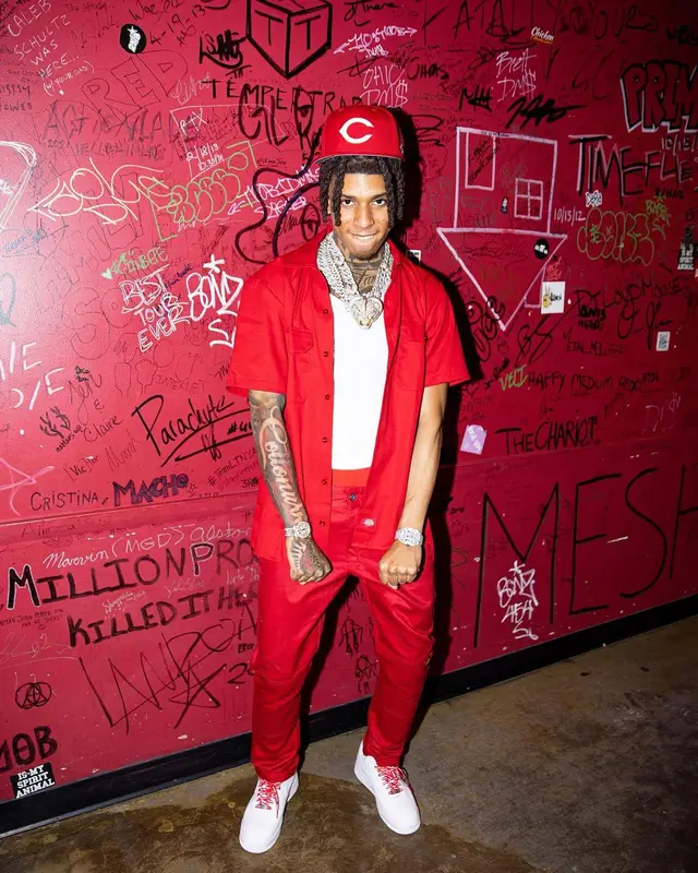 NLE Choppa outfit in Dickies, Supreme, and New Era, 2022