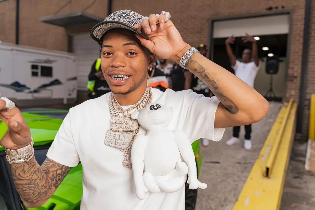 Lil Migo outfit in Dior and Louis Vuitton, 2022