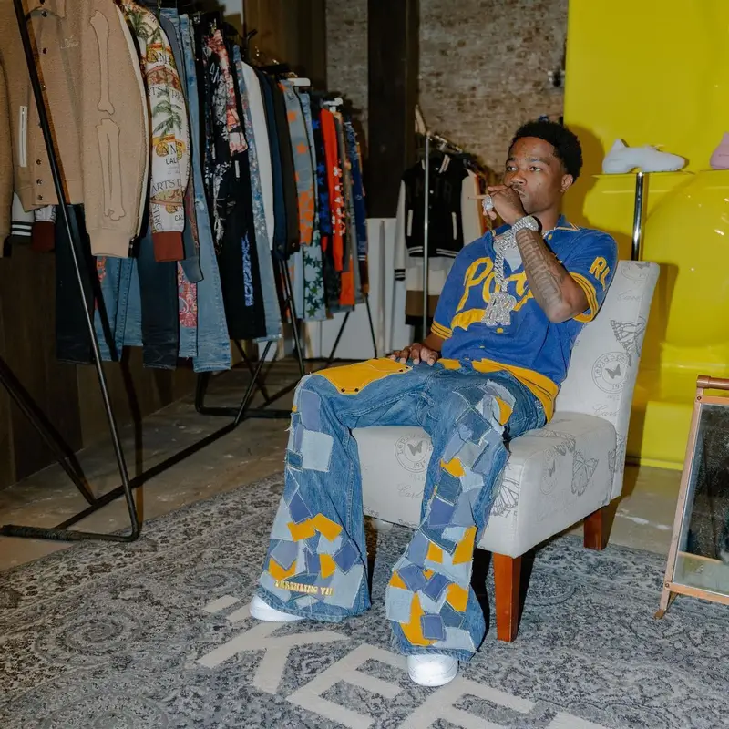 Roddy Ricch outfit in Polo Ralph Lauren, Earthling VIP, and Nike, 2022