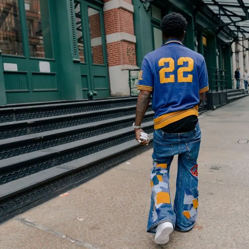 Roddy Ricch outfit in Polo Ralph Lauren, Earthling VIP, and Nike, 2022