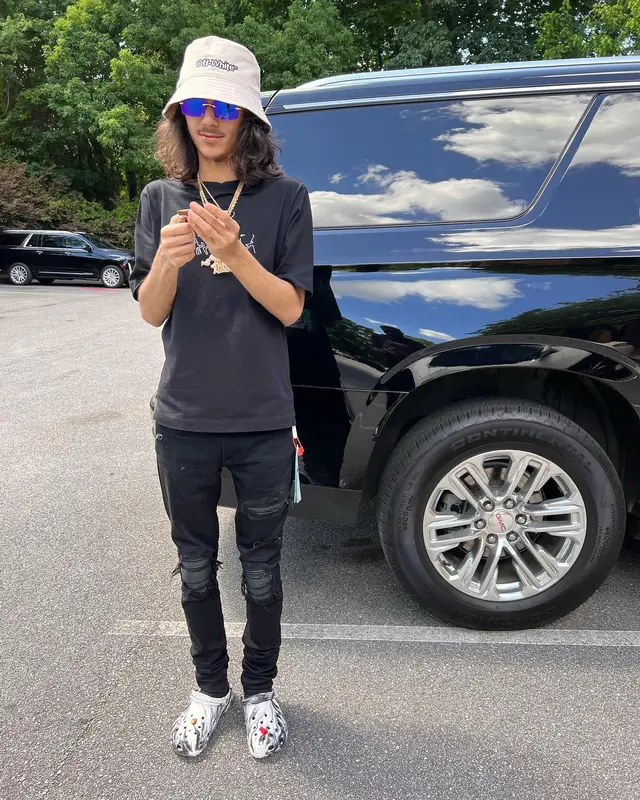 BabyTron outfit in Amiri, Cartier, and Off-White, 2022
