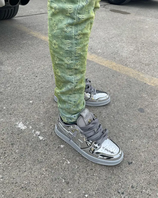 BabyTron outfit in Purple Brand, Bape, and Cartier, 2022