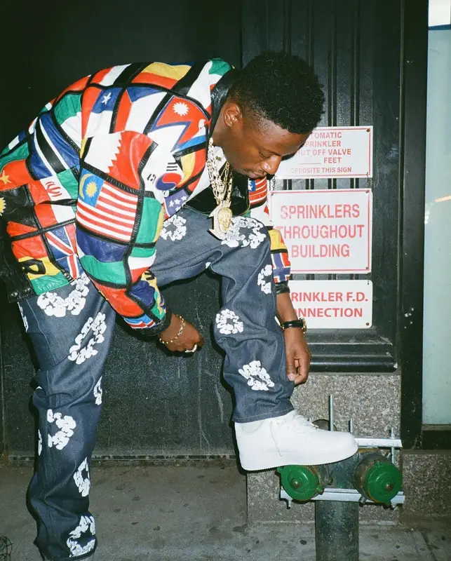 Joey Badass outfit in Levi’s, Casablanca, and Denim Tears, 2022