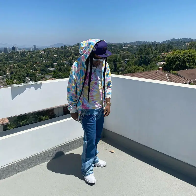 Takeoff outfit in Bape, Louis Vuitton, and New Era, 2020
