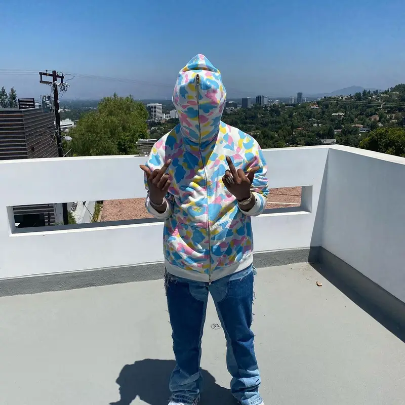 Takeoff outfit in Bape, Louis Vuitton, and New Era, 2020
