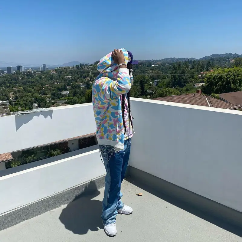 Takeoff outfit in Bape, Louis Vuitton, and New Era, 2020