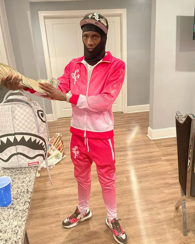PGF Nuk outfit in Valentino, Sprayground, and New Era, 2022