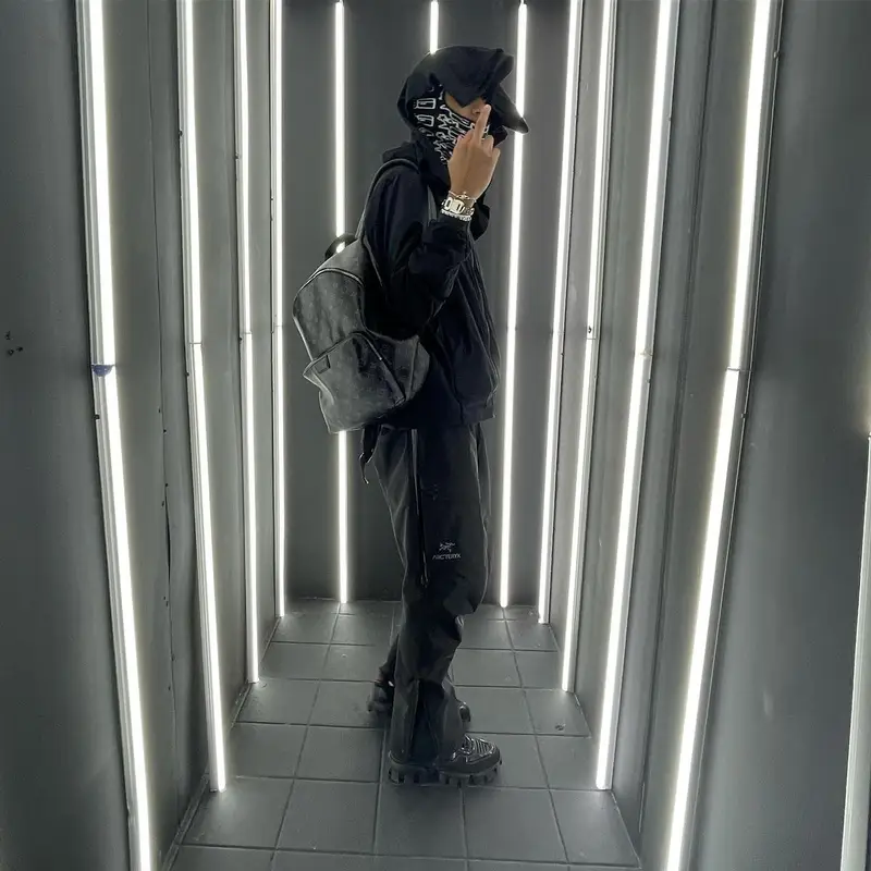 Slump6s outfit in Arc'teryx, Prada, and Louis Vuitton, 2022