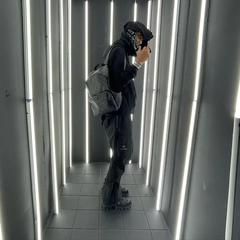 Slump6s outfit in Arc'teryx, Prada, and Louis Vuitton, 2022