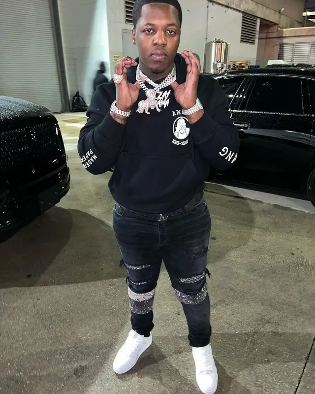 Lil Zay Osama outfit in Amiri, Louis Vuitton, and Zig-Zag World, 2022