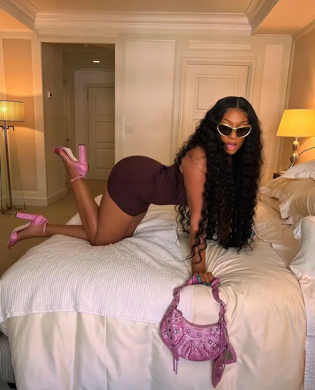 Megan Thee Stallion outfit in Balenciaga and FashionNova, 2022