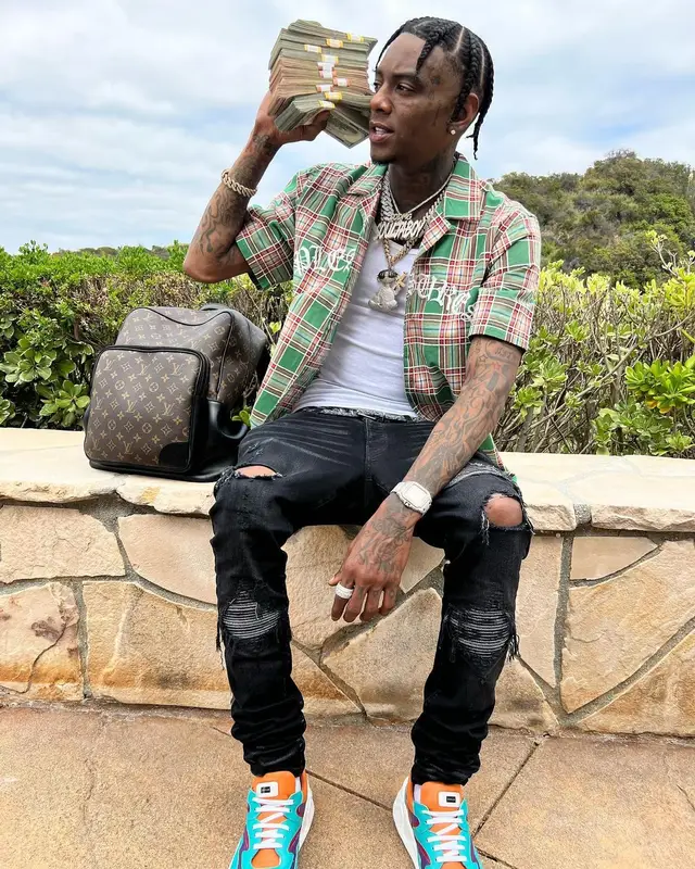 Soulja Boy outfit in Pleasures, Amiri, and Louis Vuitton, 2022