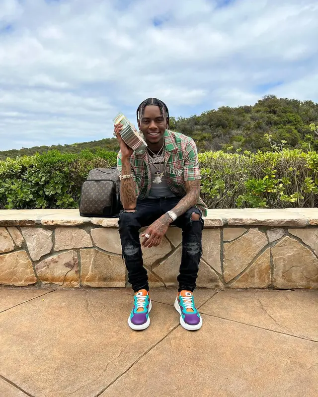 Soulja Boy outfit in Pleasures, Amiri, and Louis Vuitton, 2022