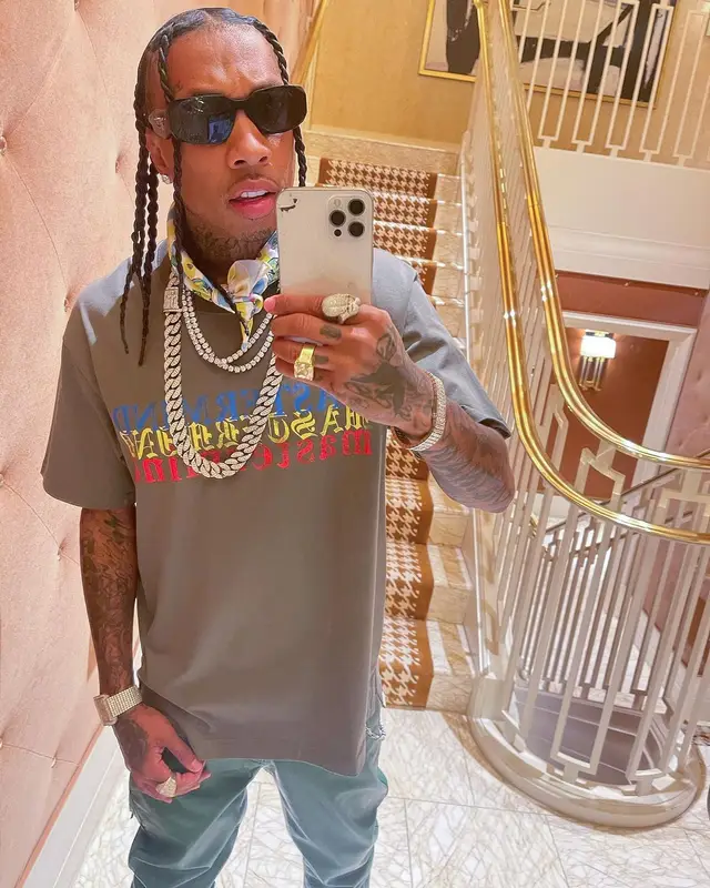 Tyga outfit in Mastermind, Nike, and Prada, 2022