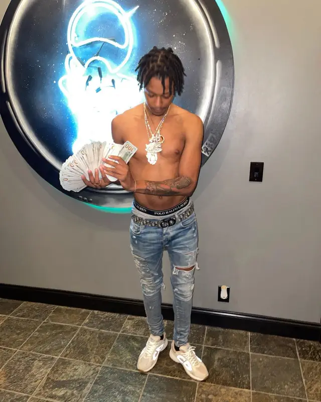 Skilla Baby outfit in Amiri, Dior, and Polo Ralph Lauren, 2022
