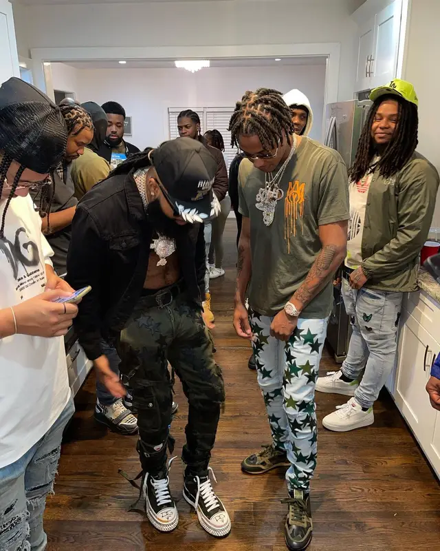 Skilla Baby outfit in Amiri, Chemist, and Cartier, 2022