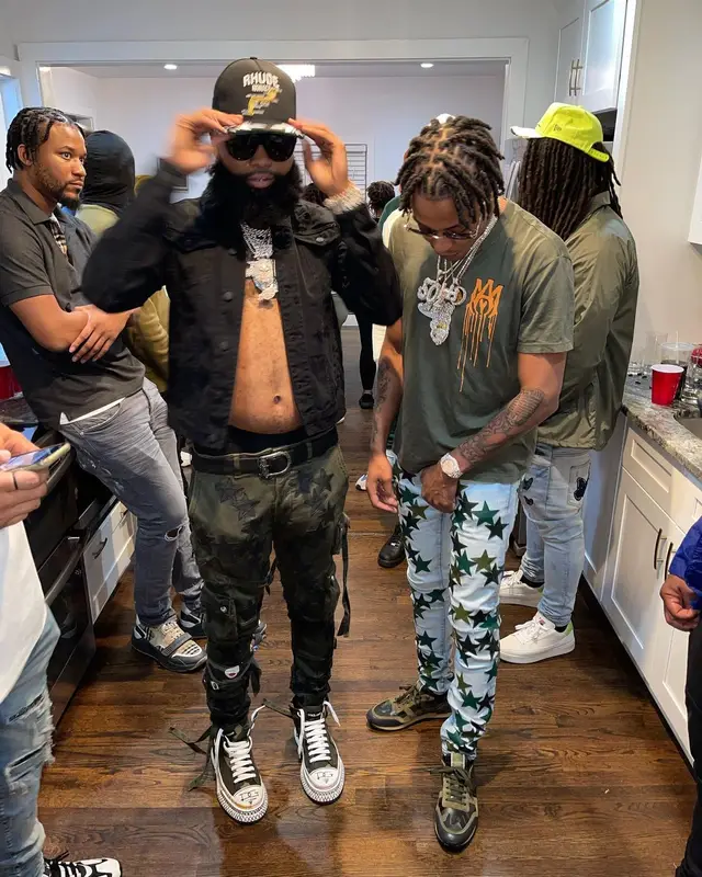 Skilla Baby outfit in Amiri, Chemist, and Cartier, 2022