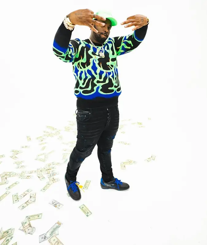 Peezy outfit in Louis Vuitton, Amiri, and Jordan, 2022