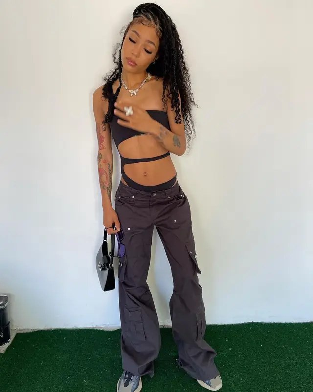 Coi Leray outfit in I.Am.Gia, Alexander Wang, and Balenciaga, 2022