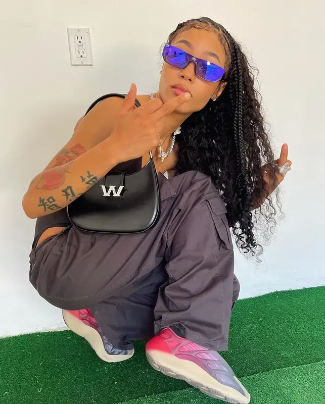 Coi Leray outfit in I.Am.Gia, Alexander Wang, and Balenciaga, 2022