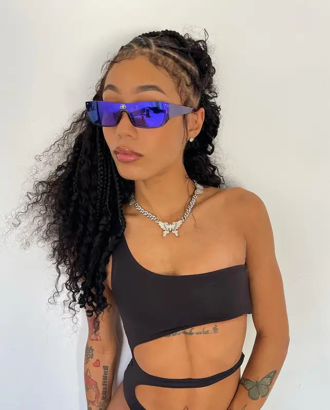 Coi Leray outfit in I.Am.Gia, Alexander Wang, and Balenciaga, 2022