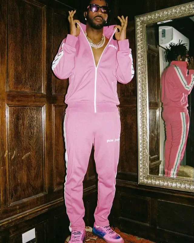 Juicy J outfit in Palm Angels, Louis Vuitton, and Dior, 2022