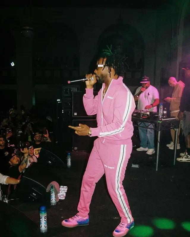 Juicy J outfit in Palm Angels, Louis Vuitton, and Dior, 2022