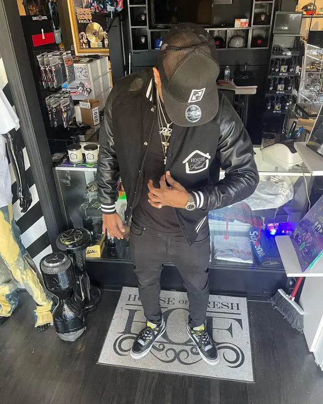 Drumma Boy outfit in Jordan, Dolce & Gabbana, and Luv4Cru Branding & Co, 2022