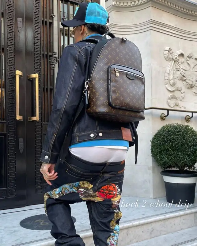Central Cee outfit in Evisu, Louis Vuitton, and Cartier, 2022