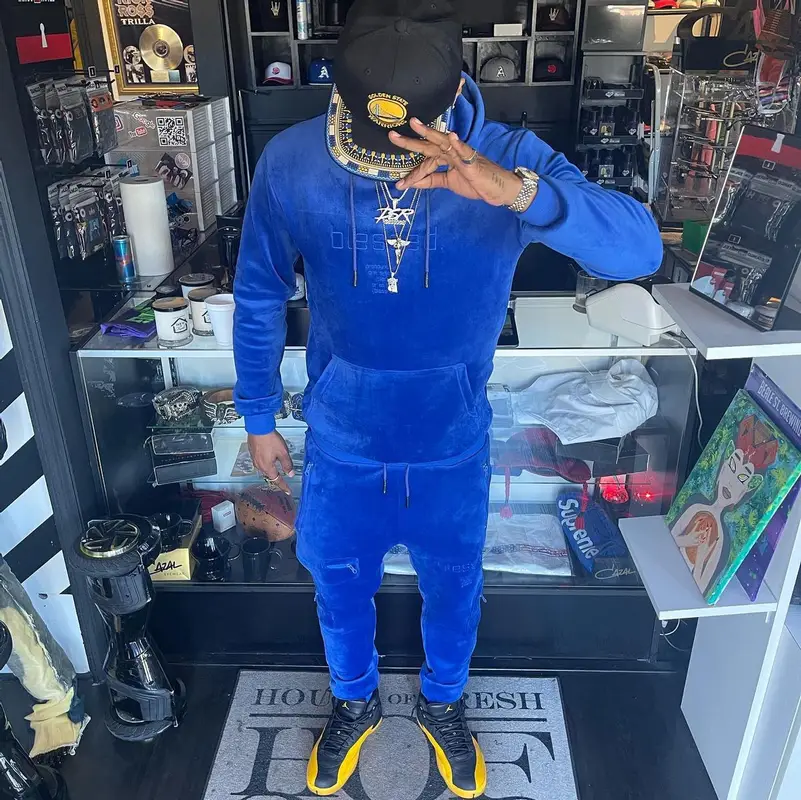 Drumma Boy outfit in The Hideout Clothing, New Era, and Jordan, 2022