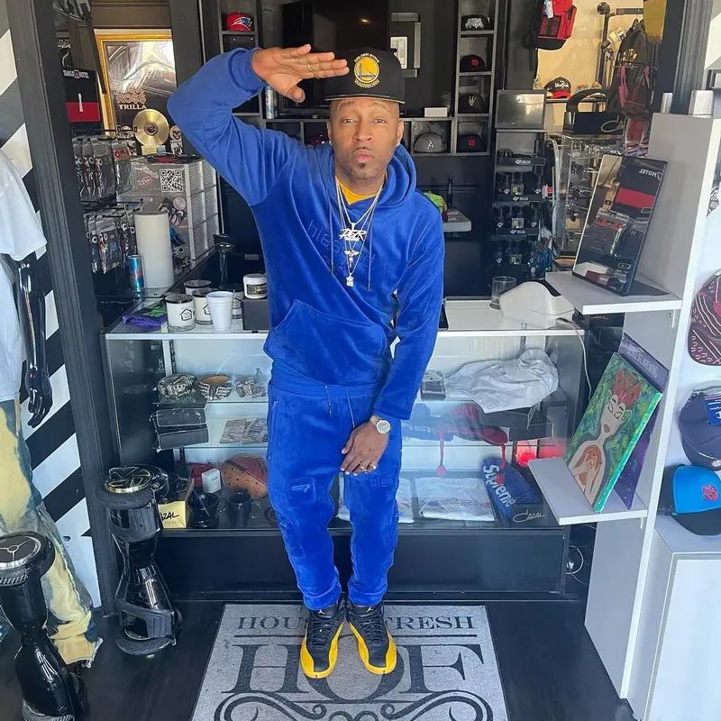 Drumma Boy outfit in The Hideout Clothing, New Era, and Jordan, 2022