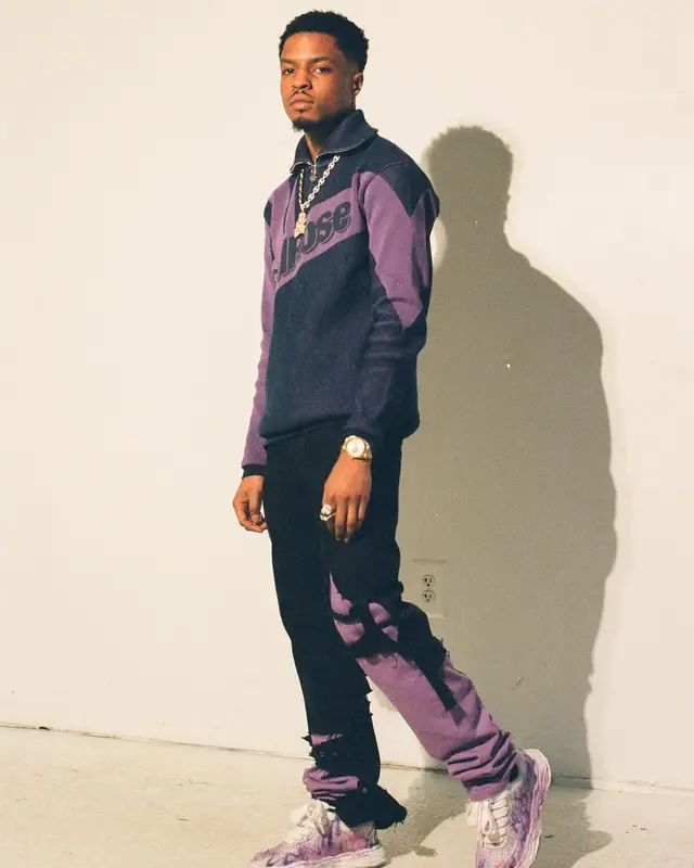 Pierre Bourne outfit in Martine Rose, Raf Simons, and Baby Brush, 2022