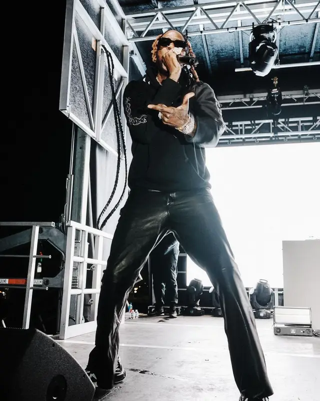 2 Chainz outfit in Cout De La Liberte, Balenciaga, and Prada, 2022