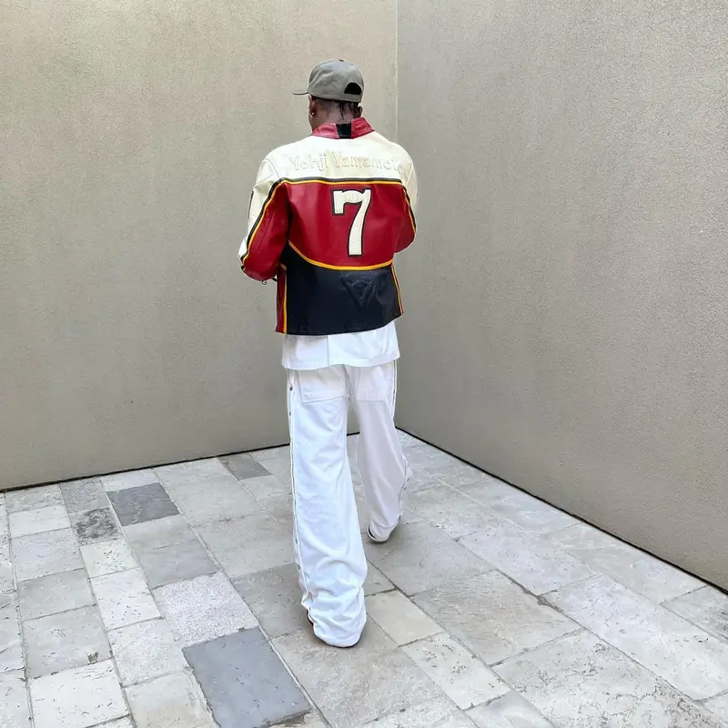 Travis Scott outfit in Yohji Yamamoto, Space Village, and Dainese, 2022