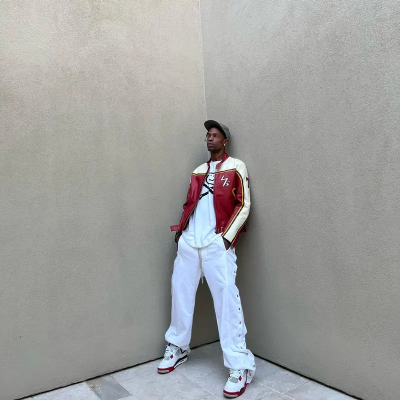Travis Scott outfit in Yohji Yamamoto, Space Village, and Dainese, 2022